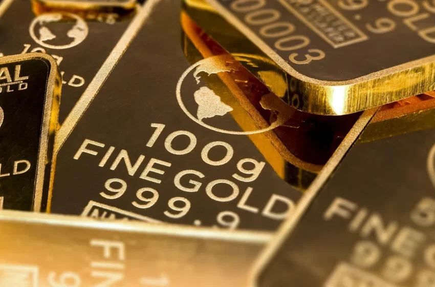Cotação do ouro recua pressionada por inflação nos EUA e tensões no Oriente Médio